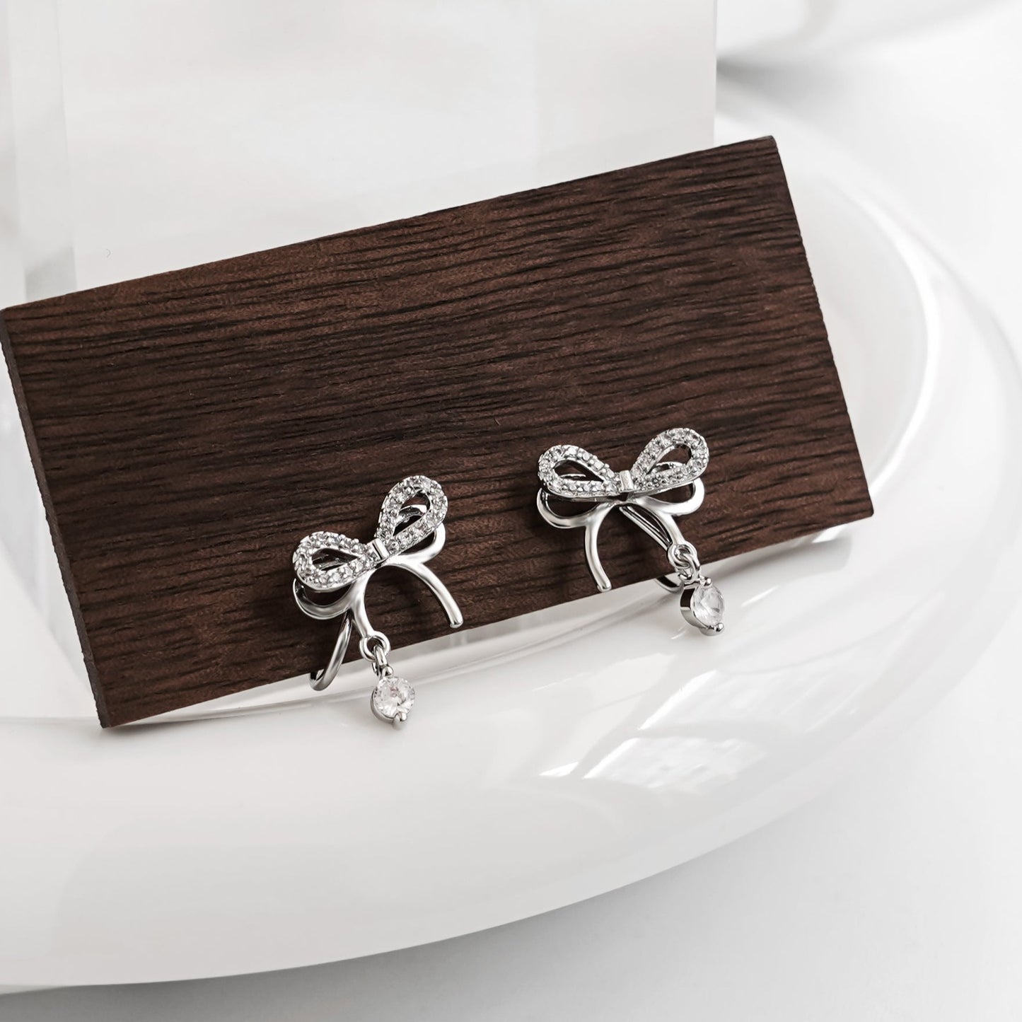 Sliver Bow with Diamond Clip On Earrings